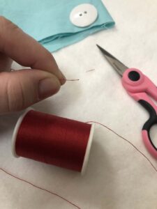 How to Sew a Two-hole Button By Hand