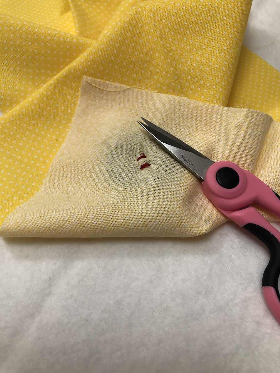 How to Sew a Fourhole Button by Hand