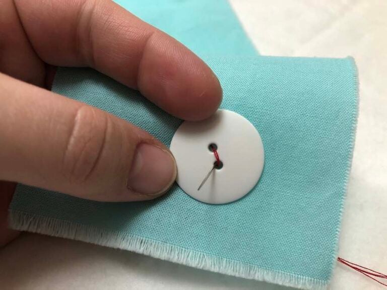 How to Sew a Twohole Button By Hand