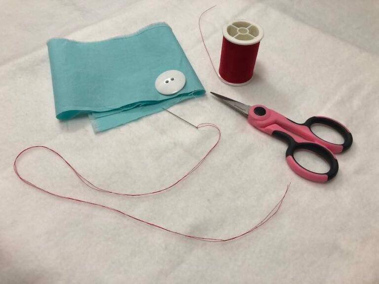 How to Sew a Two-hole Button By Hand