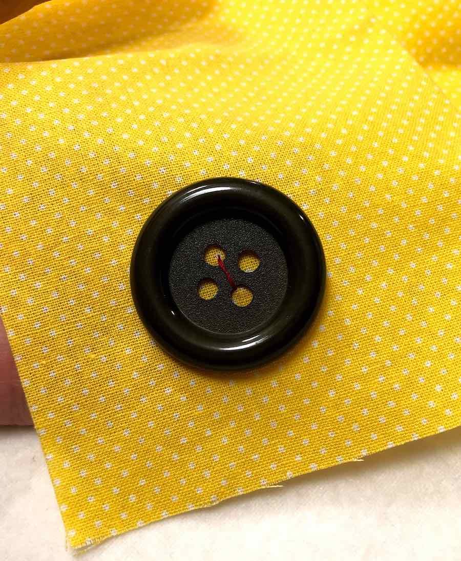 How to Sew a Fourhole Button by Hand
