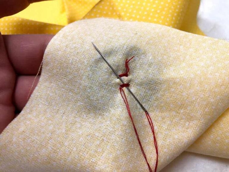 How to Sew a Fourhole Button by Hand