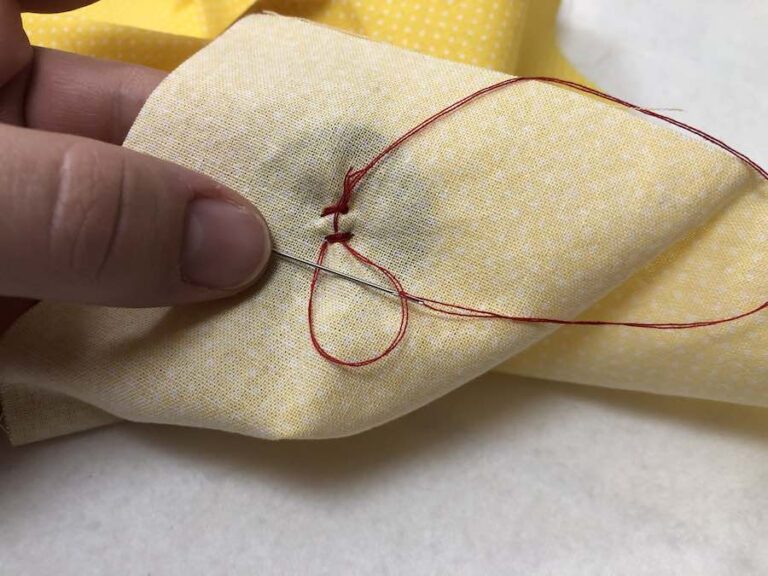 How to Sew a Fourhole Button by Hand