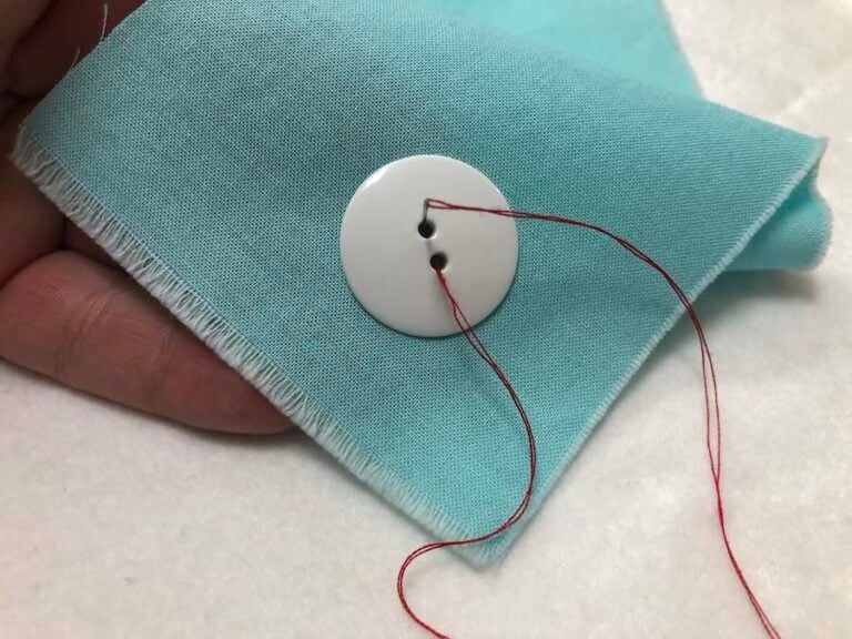 How to Sew a Twohole Button By Hand